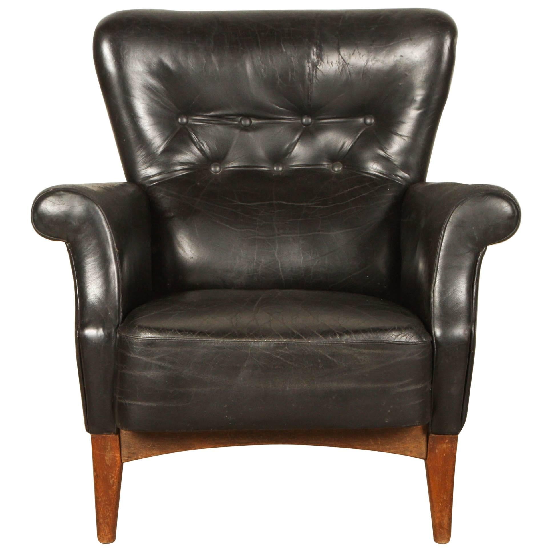 Black Leather Armchair by Finn Juhl