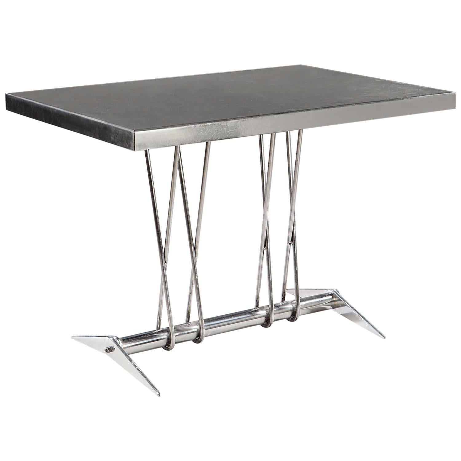Table centrale moderniste française en acier poli en vente