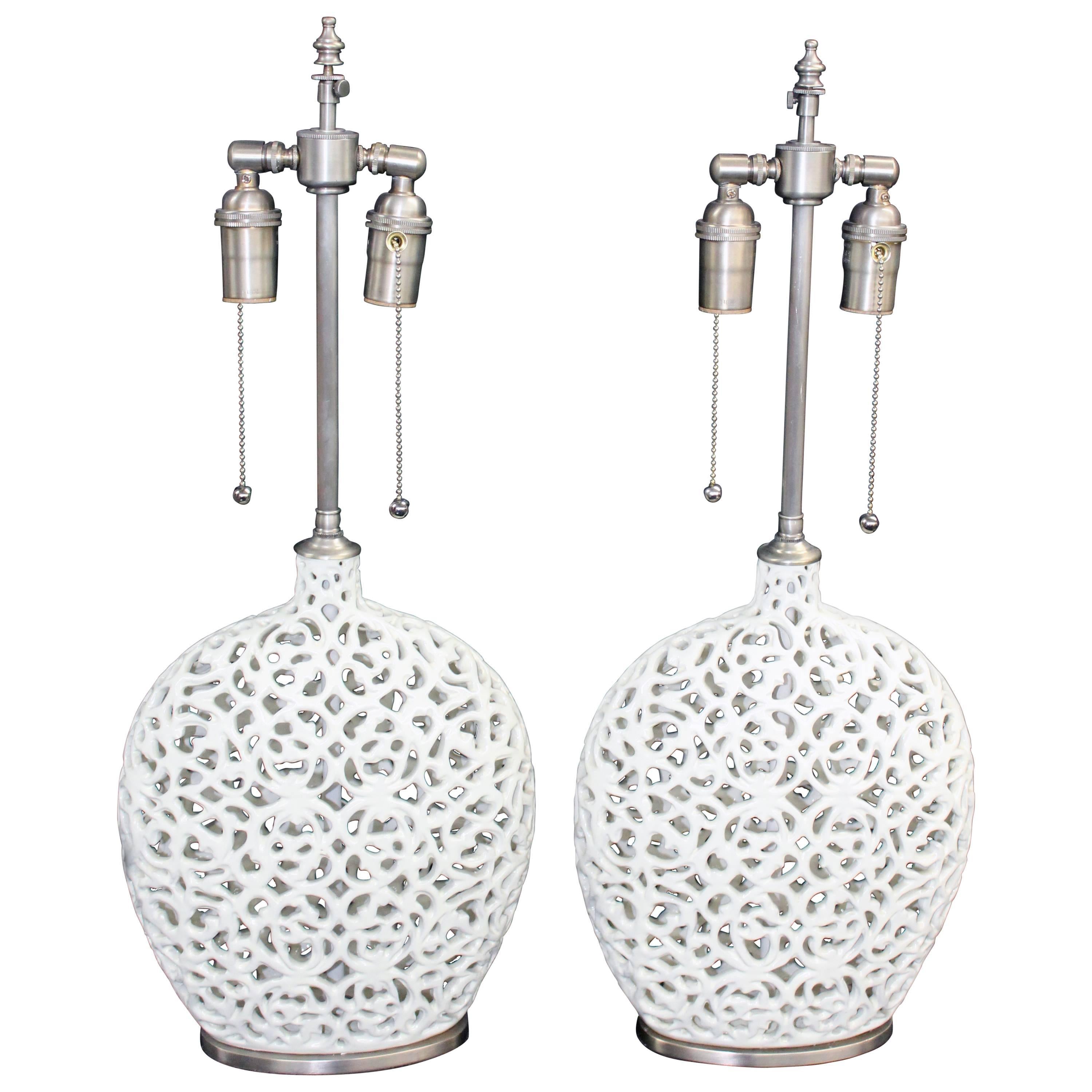 Unusual Pair of Cream Colored Ceramic Filigree Vessels with Lamp Application