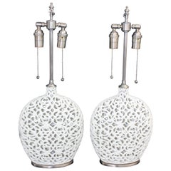 Unusual Pair of Cream Colored Ceramic Filigree Vessels with Lamp Application