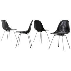 Vintage Set of Four Charles and Ray Eames Fiberglass Side Chairs in Black by Vitra