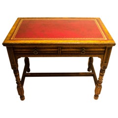 Bruce Talbert for Gillow and Co. A Gothic Revival Oak and Leather Writing Table