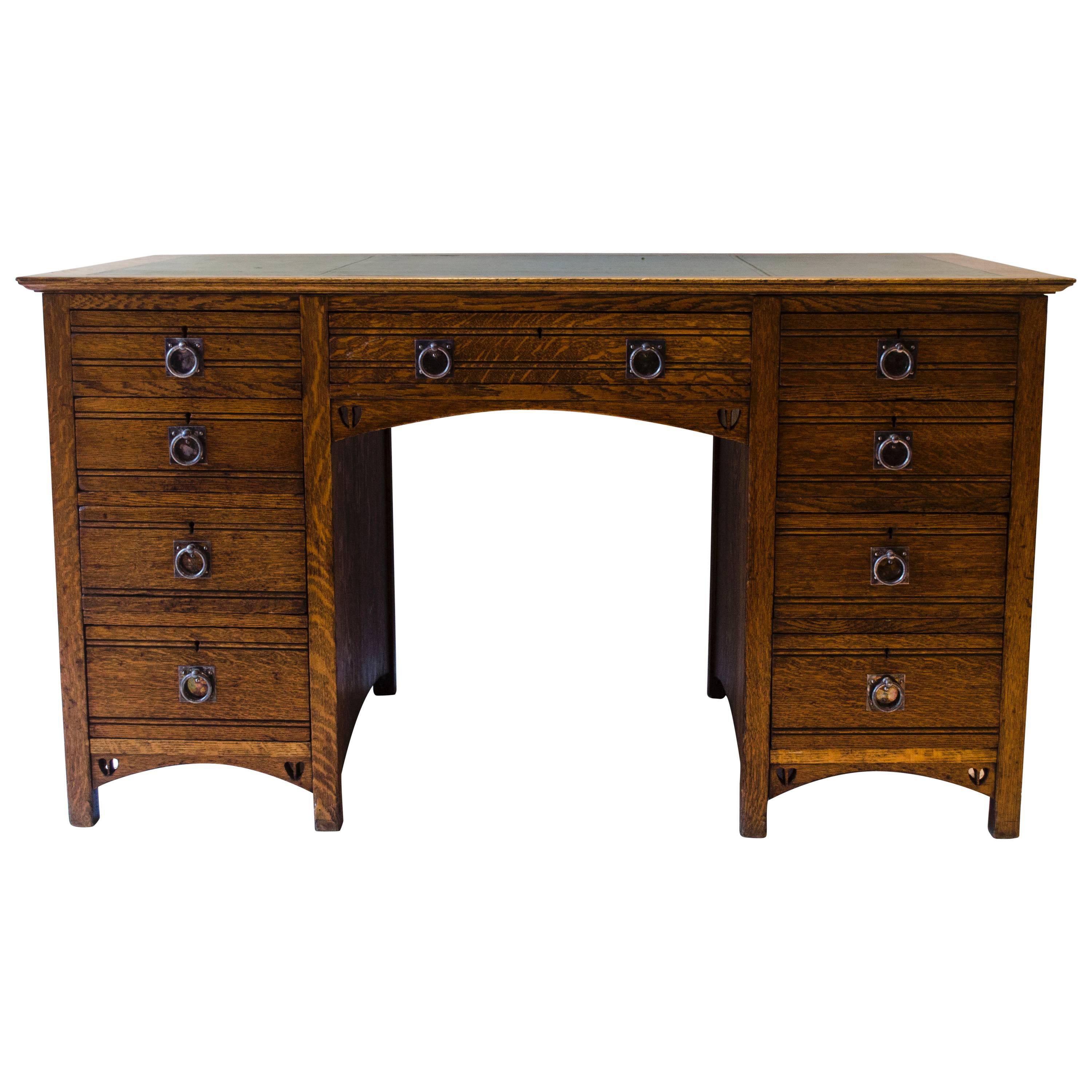 E A Taylor for Wylie & Lochhead Arts & Crafts Oak Desk with Twin Heart Details