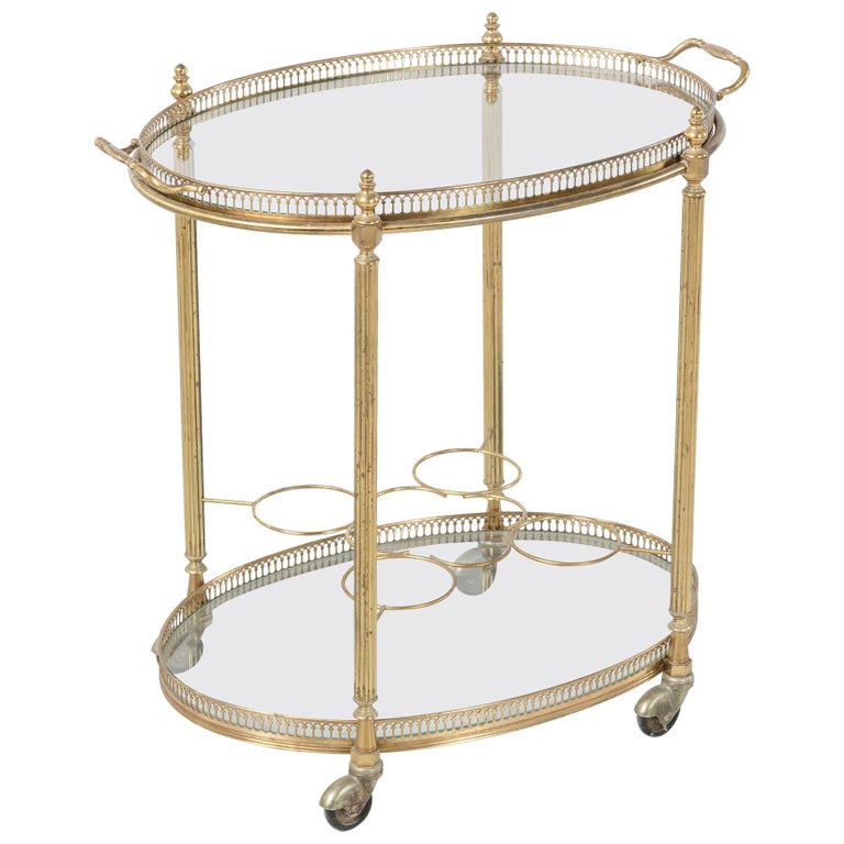 Oval French brass bar cart.