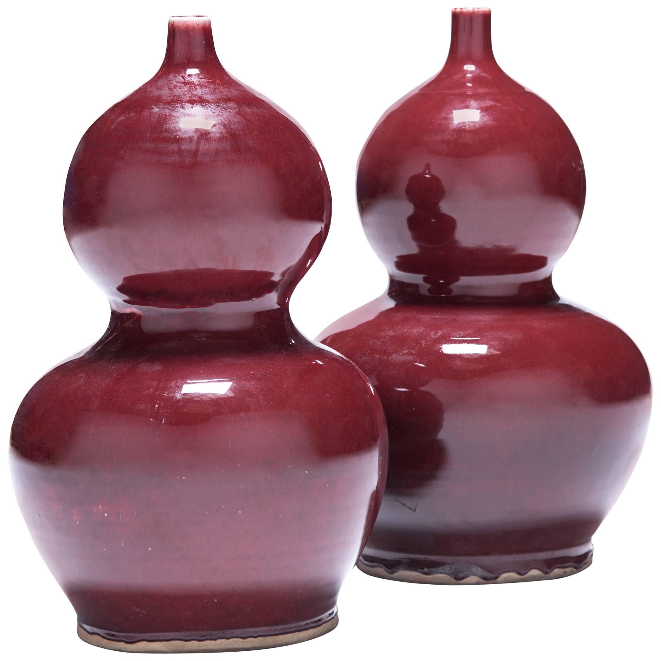 Pair of Double Gourd Sang de Boeuf Vases