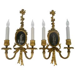 Pair of E. F. Caldwell Gilt and Patinated Bronze Neoclassical, Two-Light Sconces