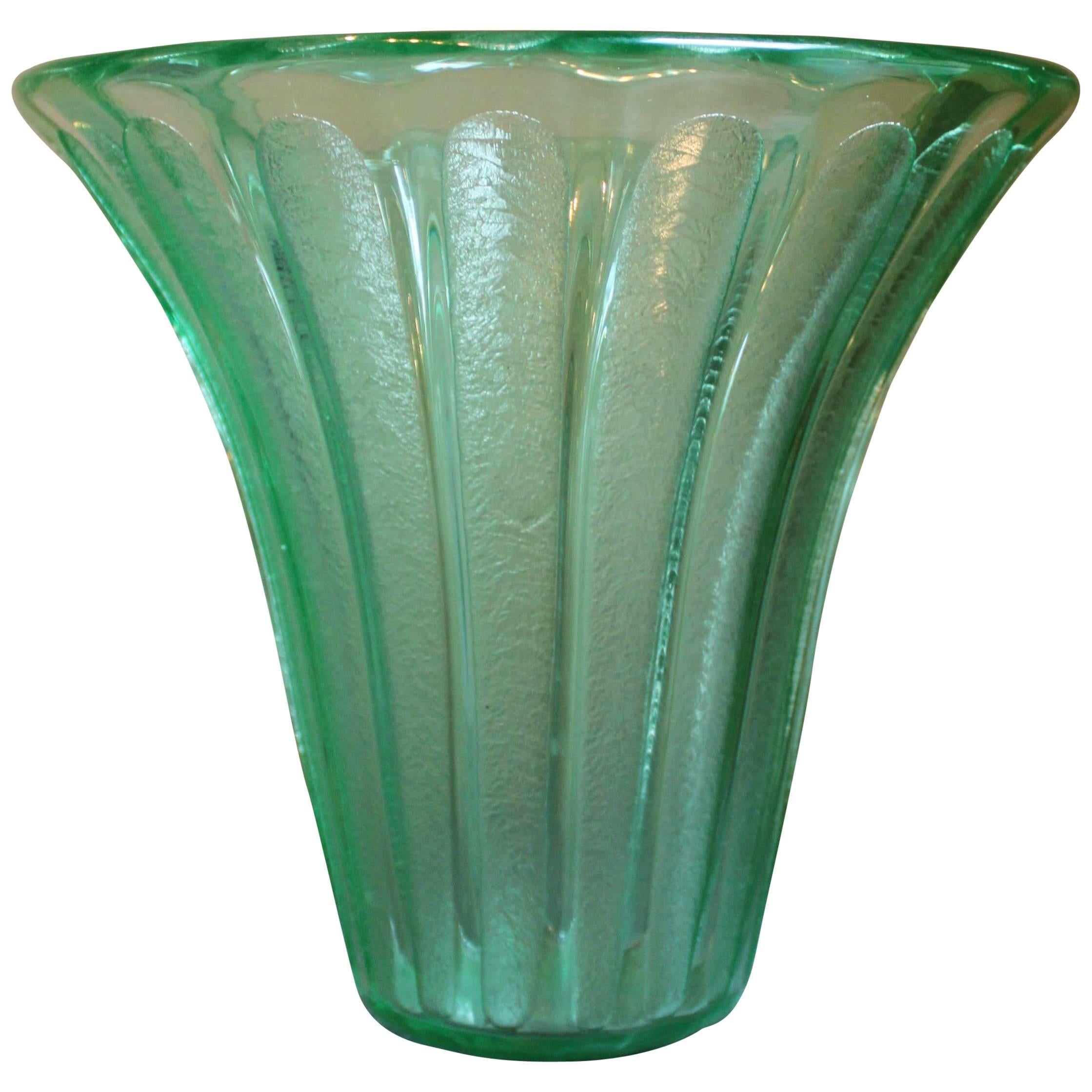 Large green glass vase signed Daum Nancy.