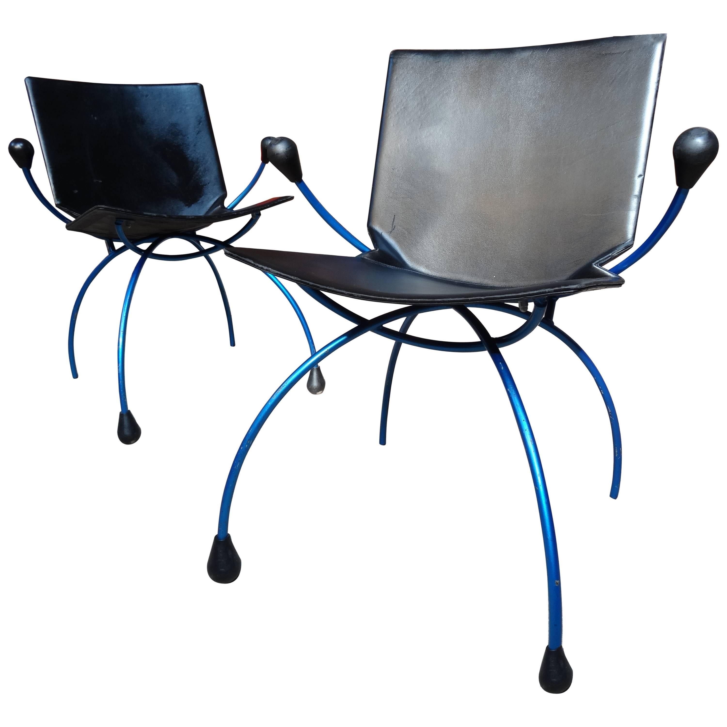 Two Blue Metal Framed 'Spider' Chairs