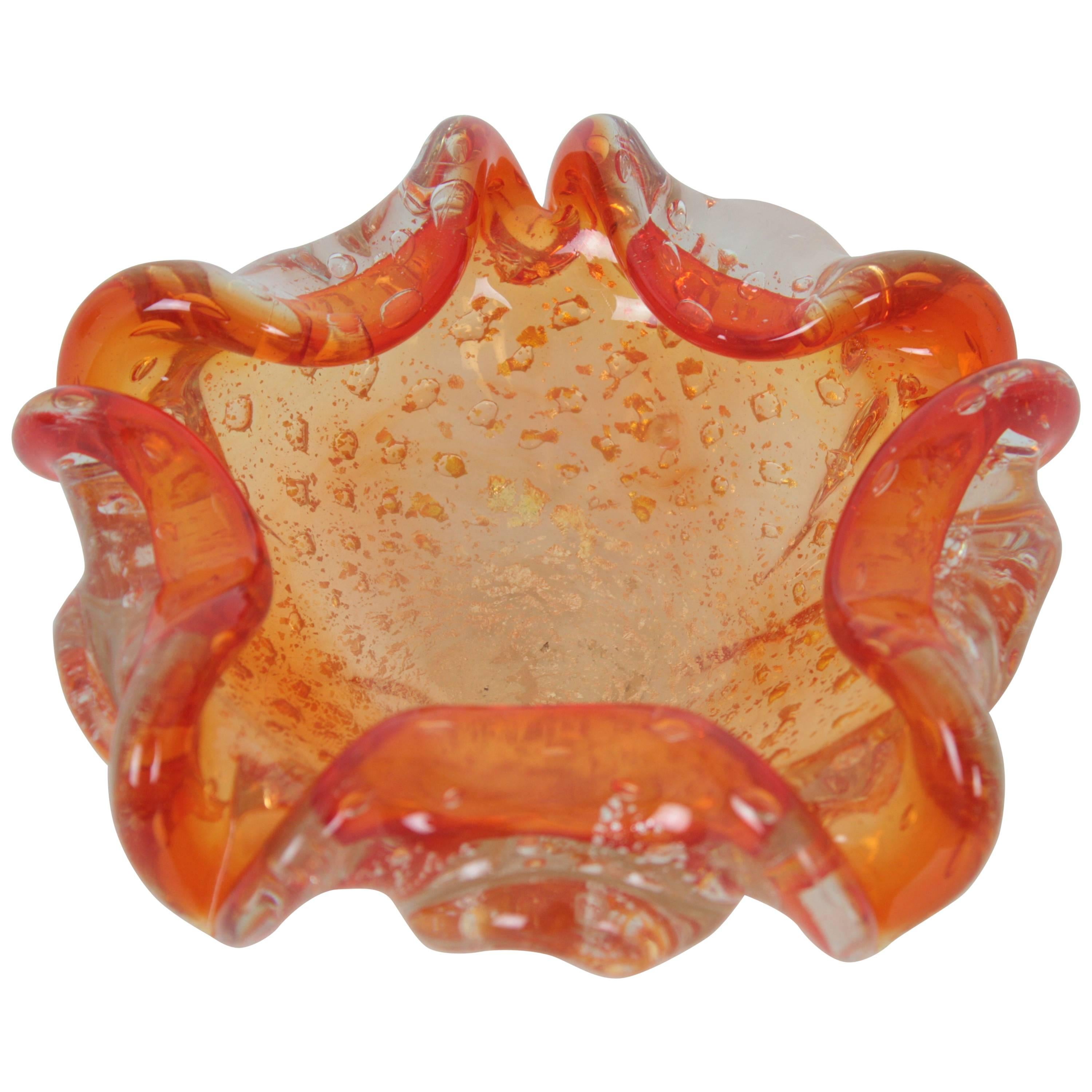 Pretty nice art glass open flower bowl or ashtray with clear and orange glass degrade and aventurine silver flecks.
This piece is in mint condition. Vibrant color and amazing design,
Italy, 1950s.

Available a huge collection of Murano glass
