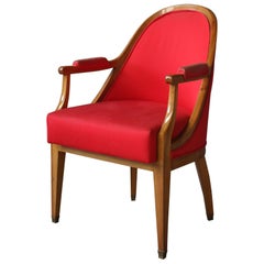 A Fine French Art Deco Walnut Gondola Armchair with Brass Sabots