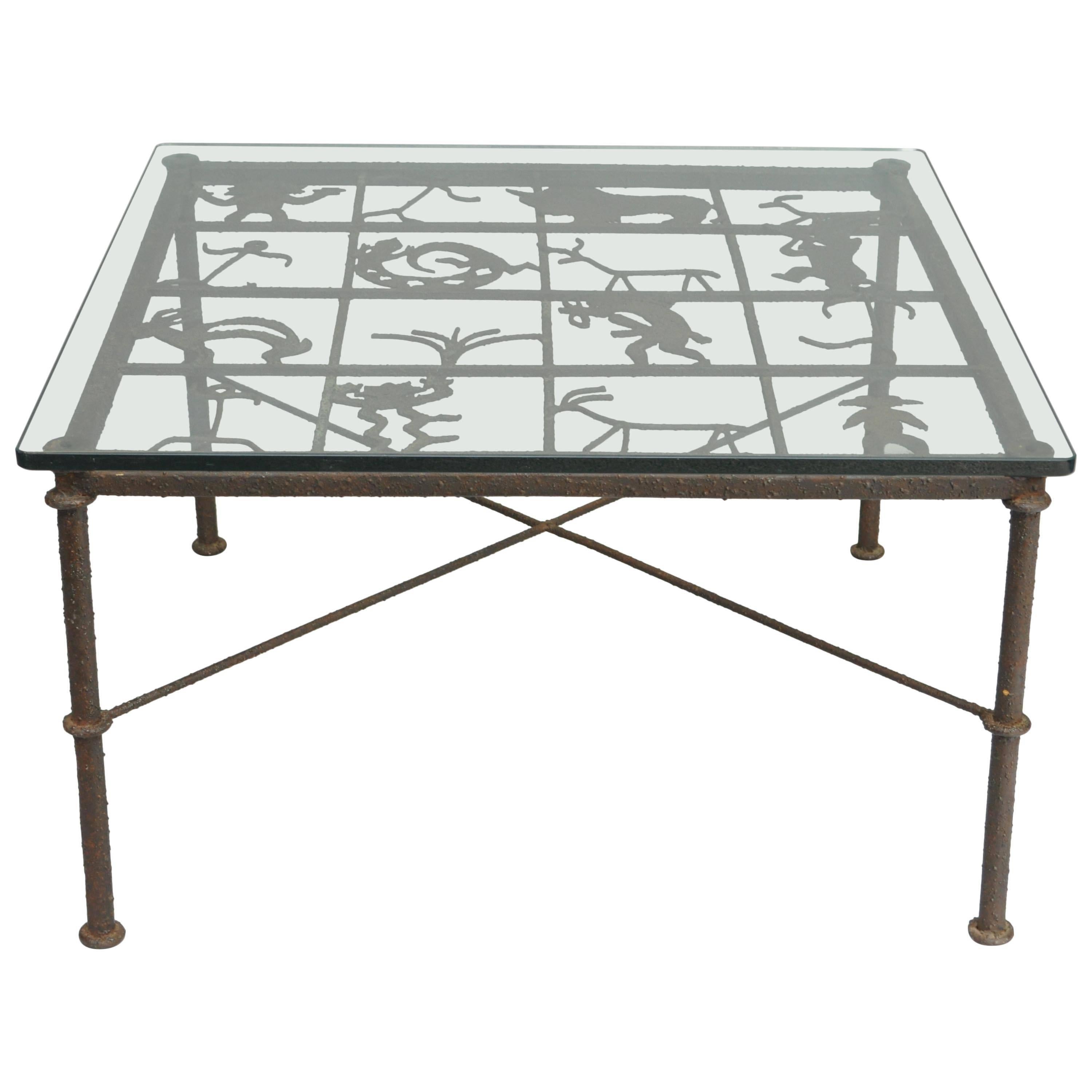 Metal and Glass Square Brutalist Coffee Table with Native American Glyph Figures For Sale