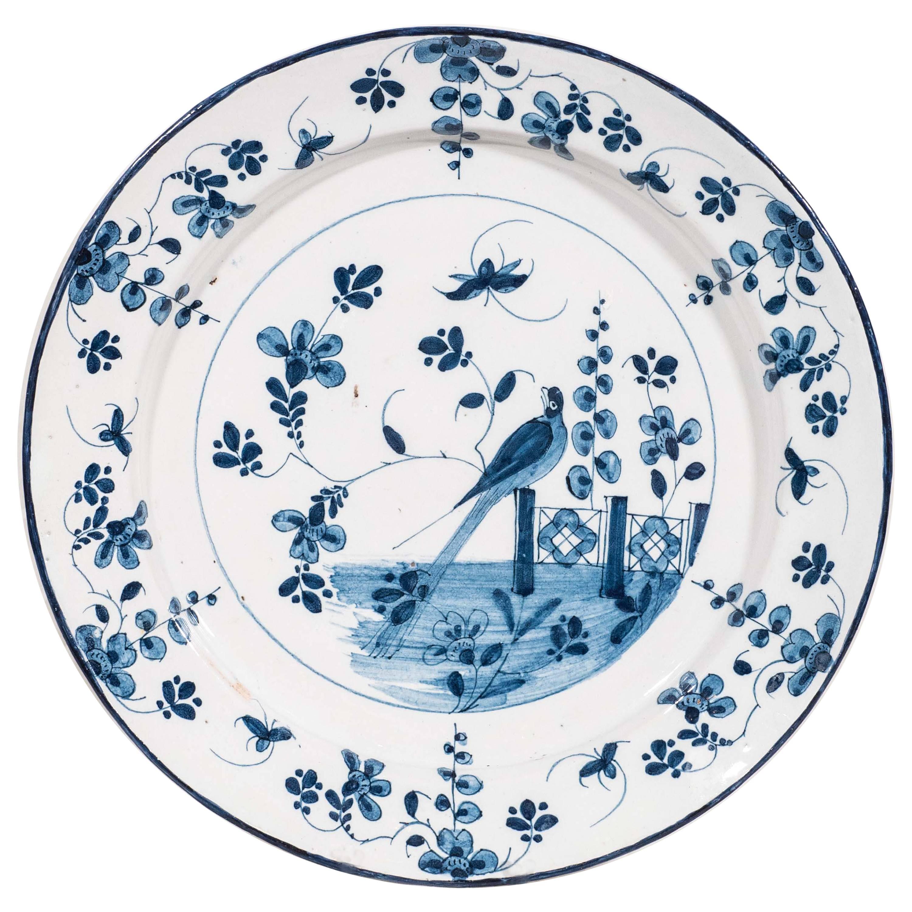Blue and White Delft Charger Decorated with a Bird in a Garden