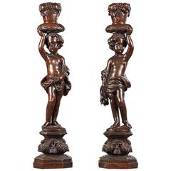 Pair of 17th Century Putti Sculpted in Walnut