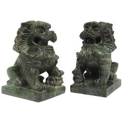 Amusing Small Pair of Serpentine Chinese Temple Lions, circa 1900