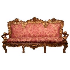 Statement Venetian carved giltwood settee, second quarter of the 19th century