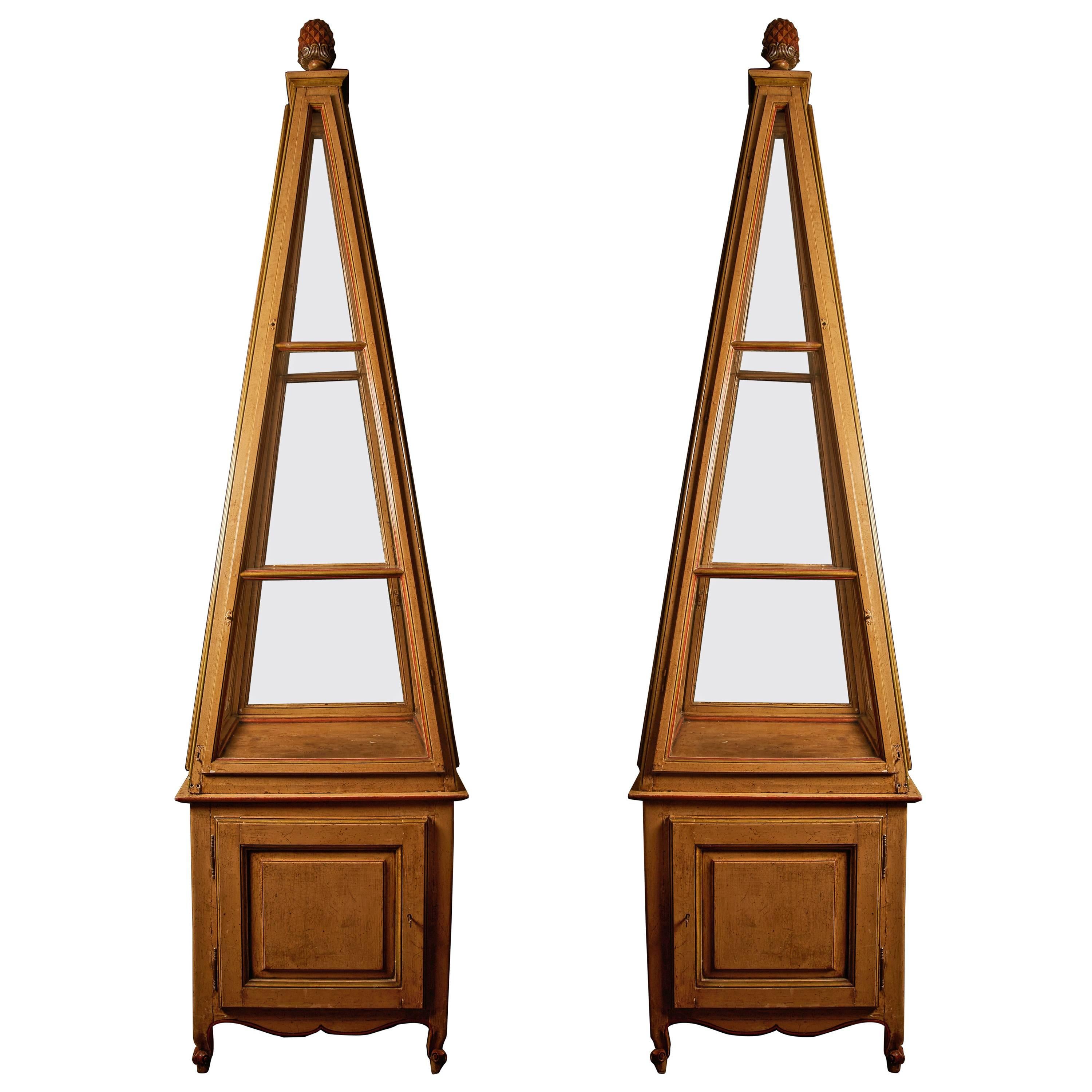 A pair of Belle Epoque polychrome-painted obelisk display vitrines, circa 1900