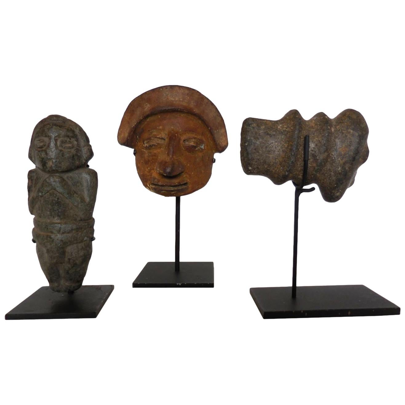 Pre Columbian Fragments on Iron Stands