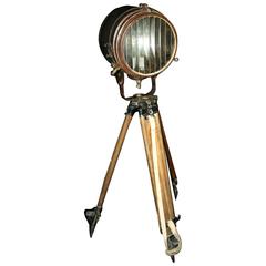 Vintage Industrial Spotlight on a Wooden Tripod