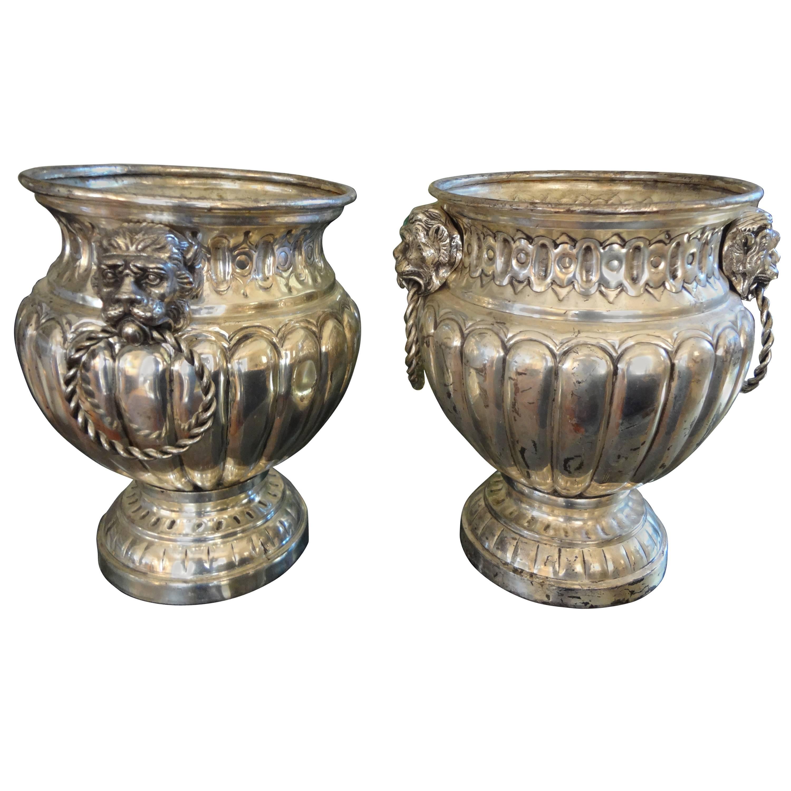 Lovely matched pair of silver plated wine or Champagne coolers with lion's head handles.
Would look great as planters with orchids.