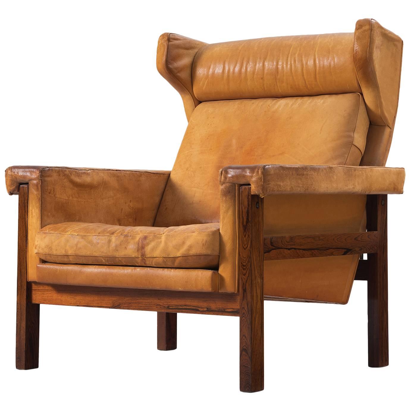 Danish Wingback Chair in Solid Rosewood and Patinated Cognac Leather