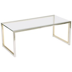 Table basse à cadre ouvert en chrome et laiton à la manière de Romeo Rega