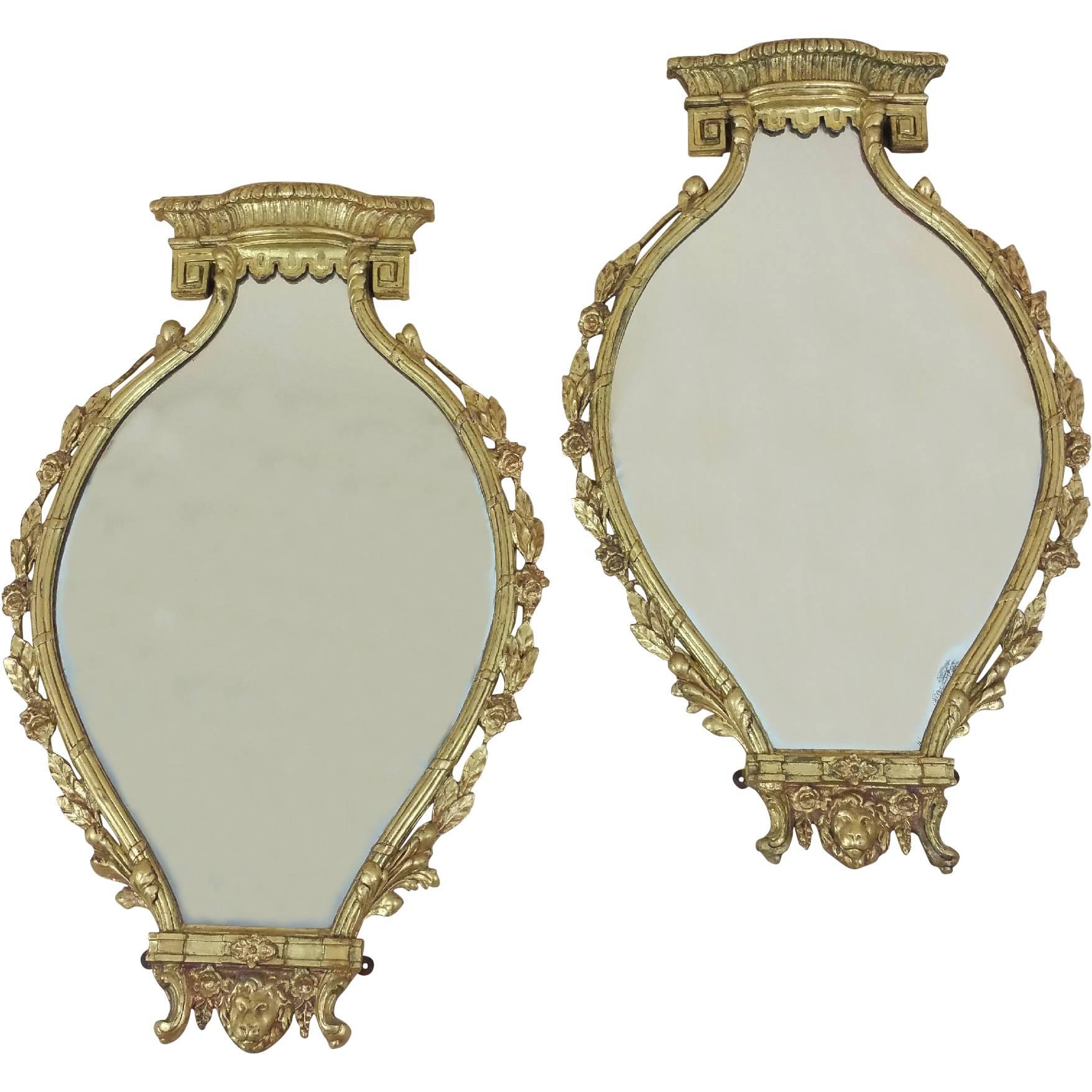 Pair of Mid-19th Century Neoclassical Gilt Shaped Wall Mirrors