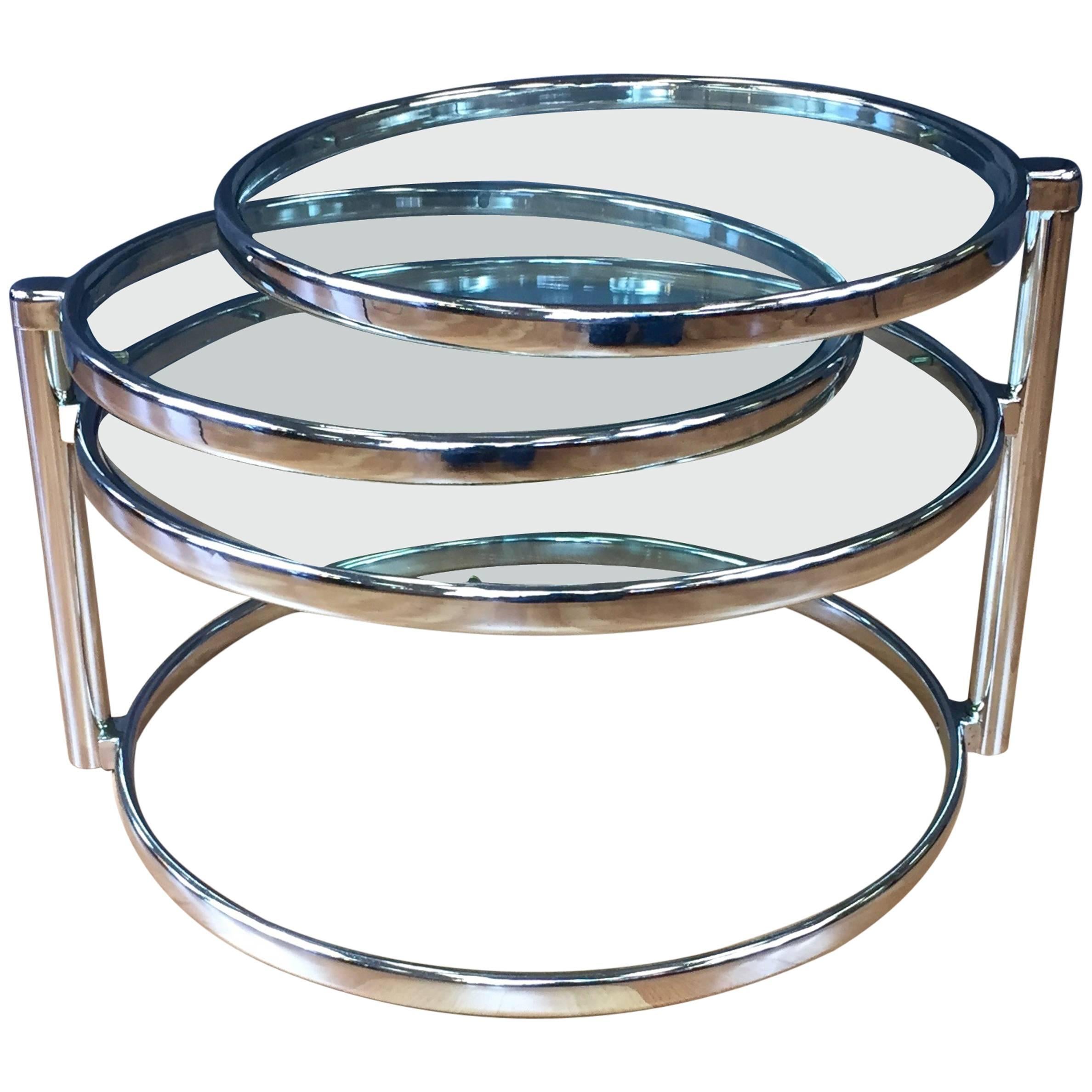 Swiveling Nickel and Glass Table in the Manner of Milo Baughman