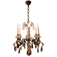 French Iron and Crystal Chandelier Attributed to Maison Baguès, circa 1940