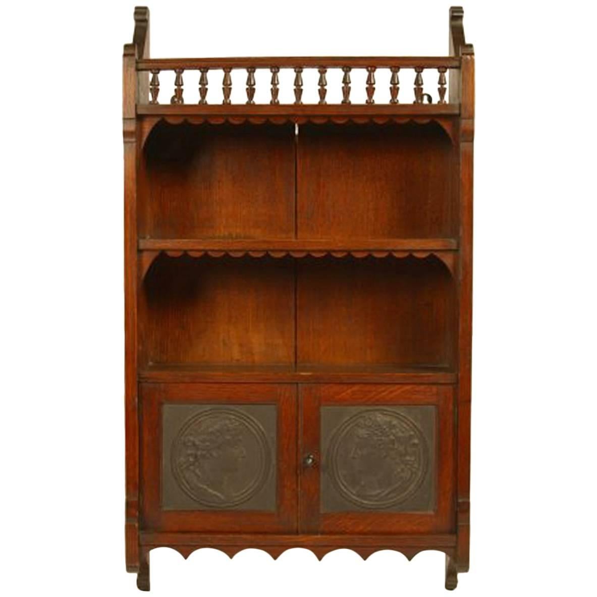  E W Godwin Attr An Anglo-Japanese Oak Wall Cabinet with embossed Leather Panels For Sale