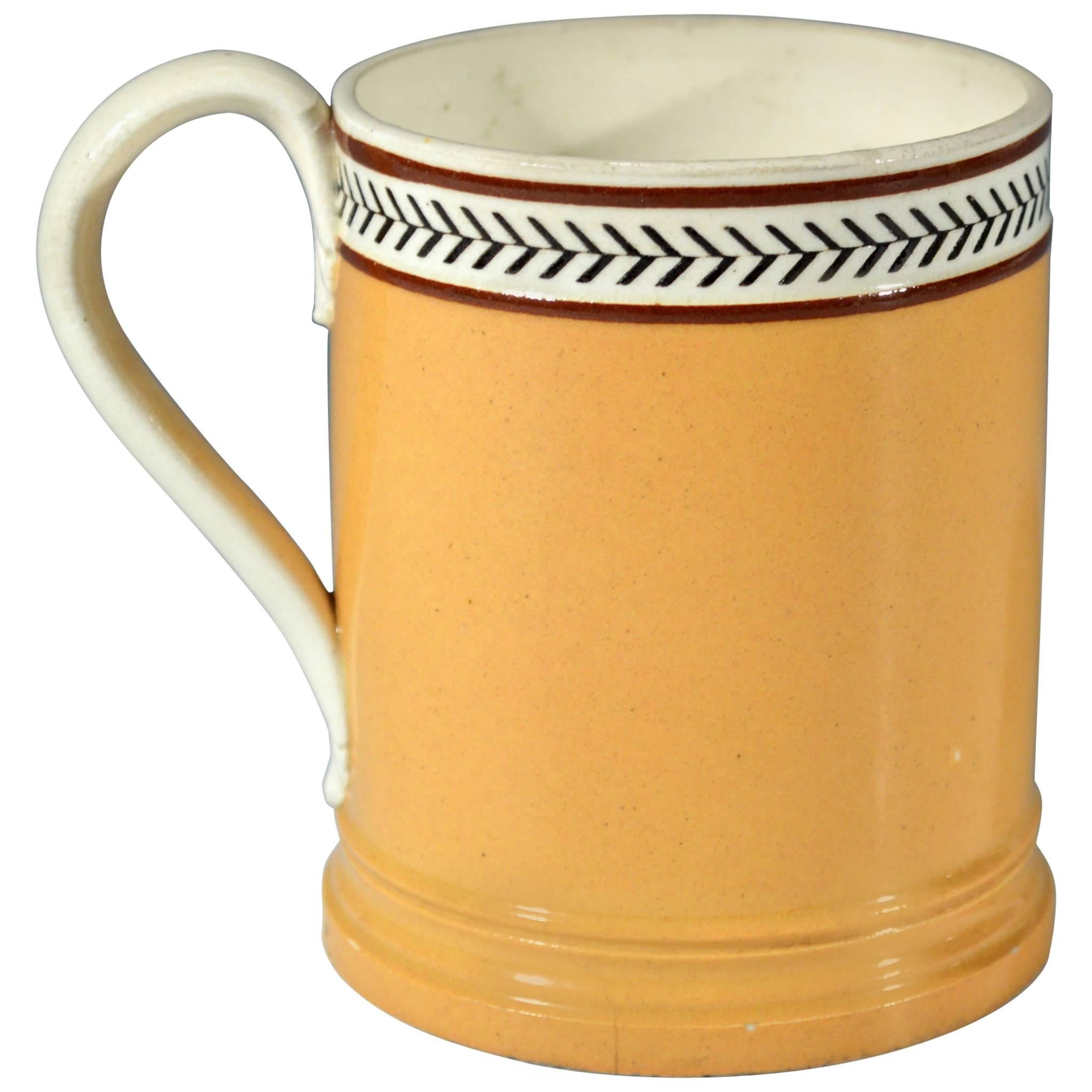 Creamware Mocha Slip-Inlaid Rouletted Tankard in Ochra