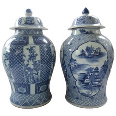 Pair of Chinese Blue and White Jars with Lids