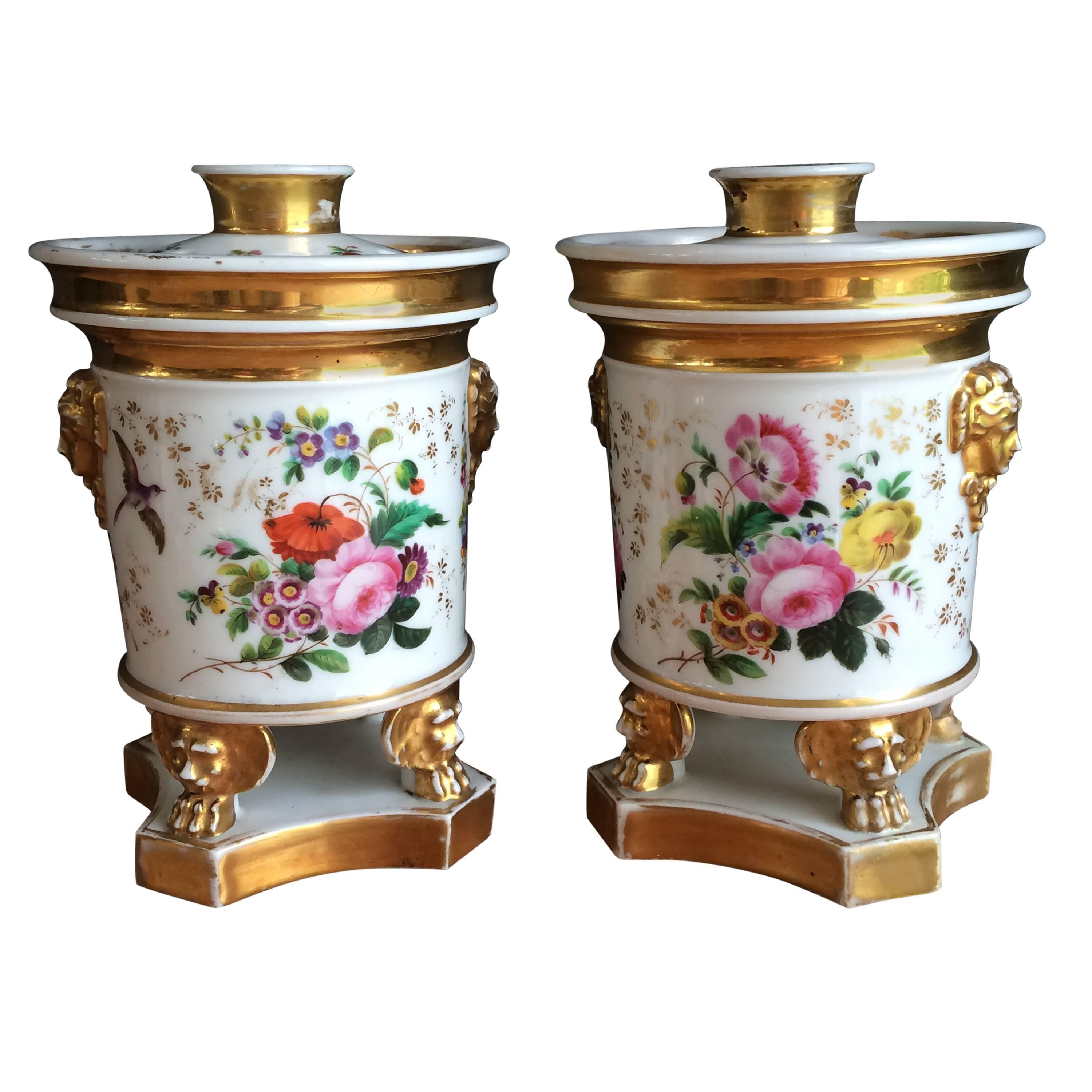 Beautiful Pair of Footed Potpourris with Floral Design and Parcel Gilt For Sale