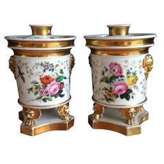 Beautiful Pair of Footed Potpourris with Floral Design and Parcel Gilt