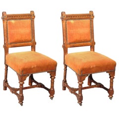 John Pollard Seddon A pair of Gothic Revival oak dining chairs. 4 more available