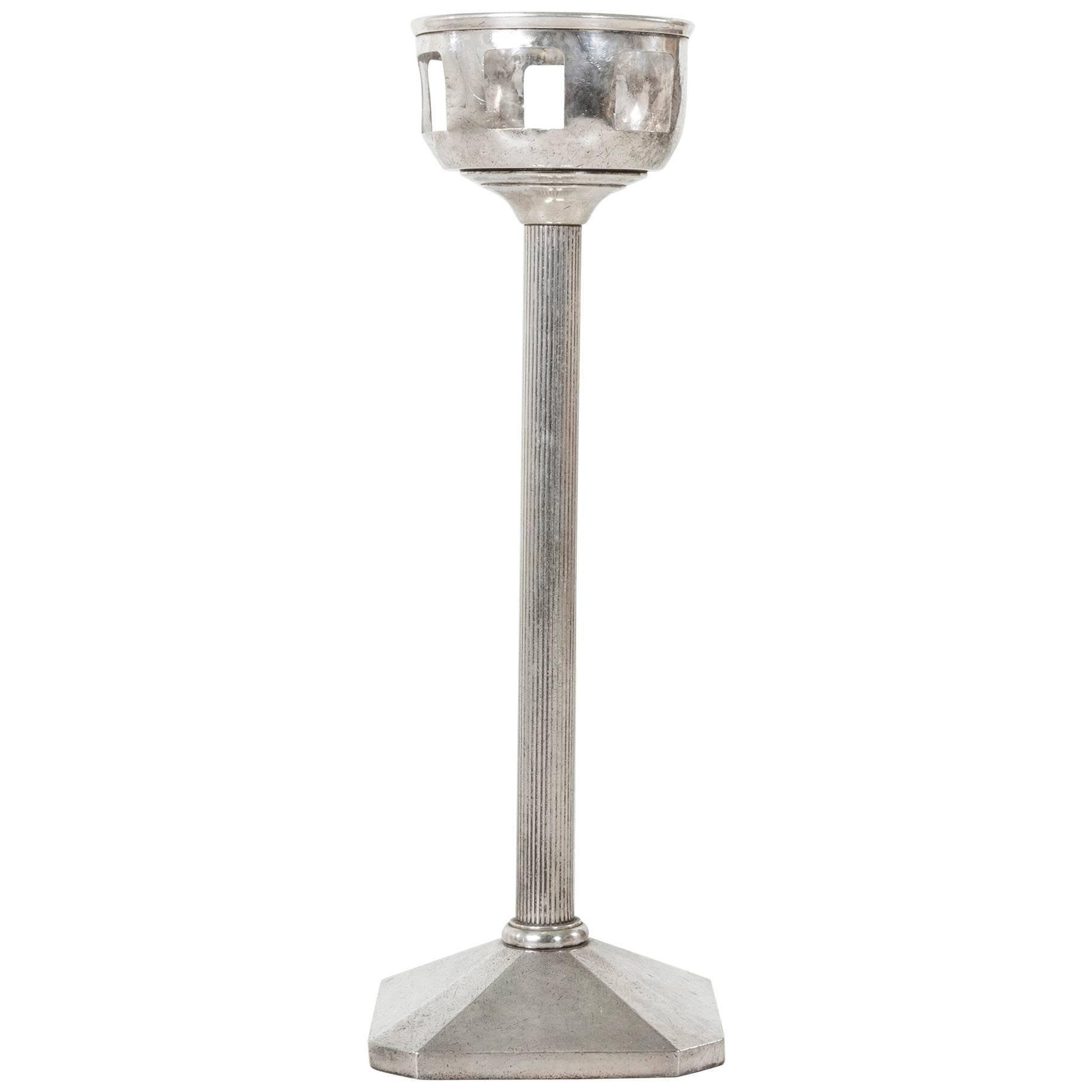 This silver plated bronze stand was created in the Art Deco era for the Casino D'Hiver in Cannes, France.  It bears a P.B. monogram on its base which stands for Palm Beach, another name for the Casino D'Hiver. Weighted at its base for sturdy use,