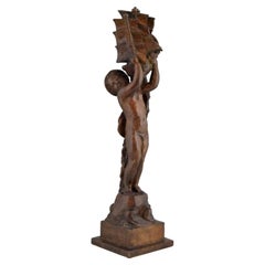 Jeune garçon et un bateau Art Déco en bronze par H. Moncassin Susse Frères France 1930