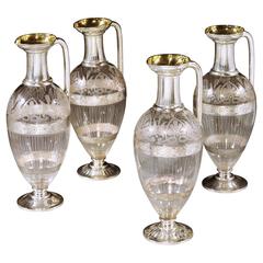 Set of Four Victorian Silver Mounted Etched Glass Claret Jugs