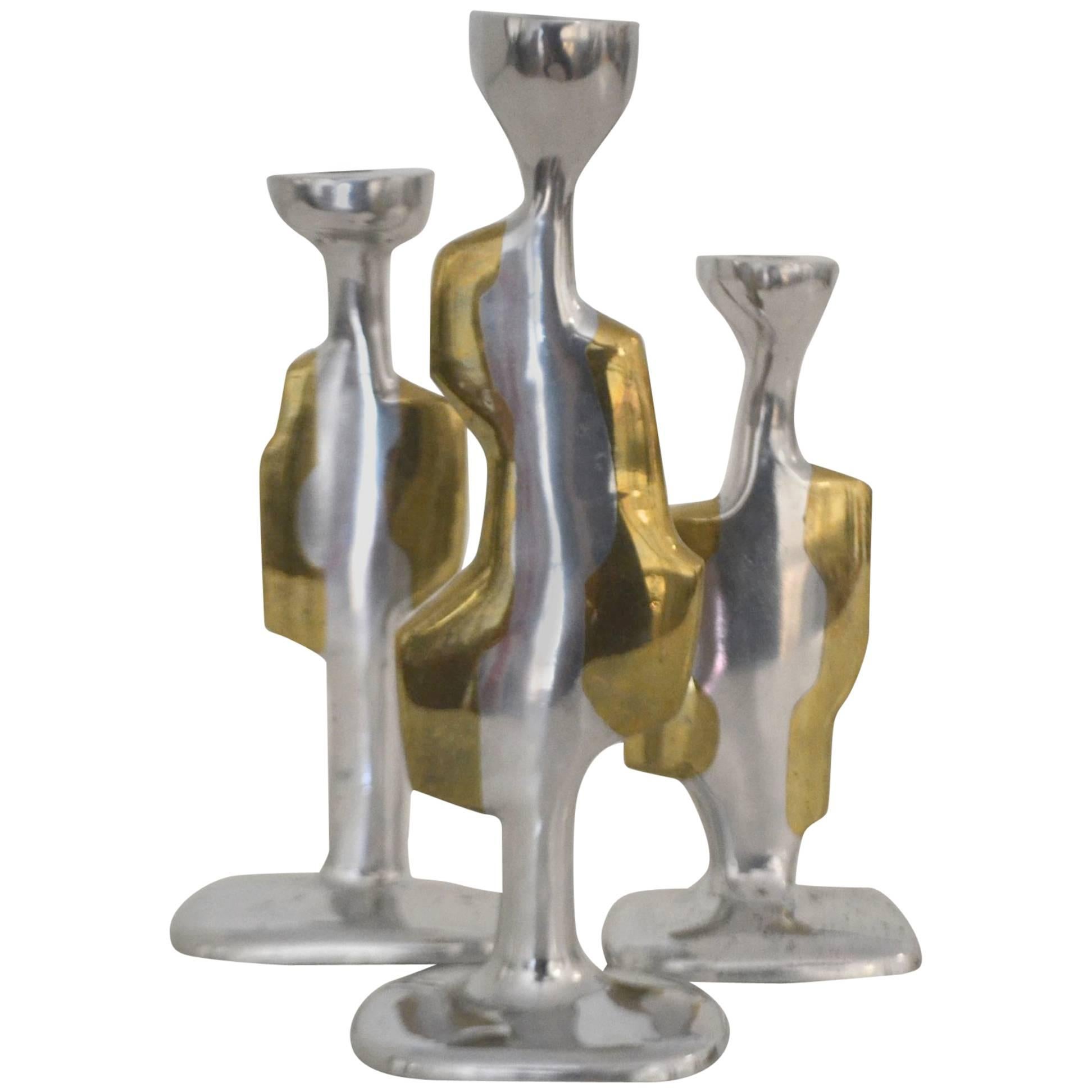 Set of Three Spanish Art Deco Aluminum and Bronze Figural Candlesticks