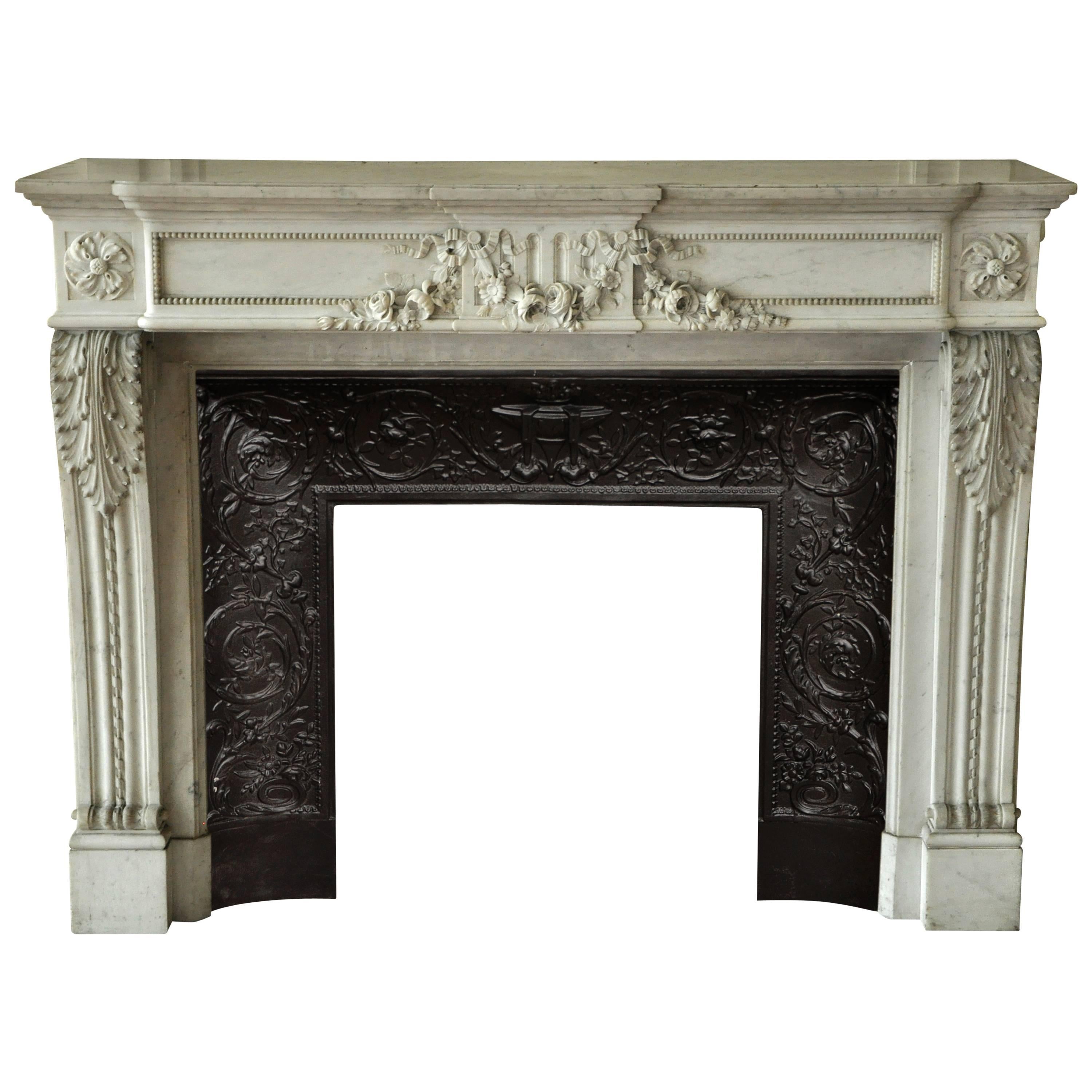 Louis XVI Style Fireplace in White Carrara Marble with Carved Garland of Flowers