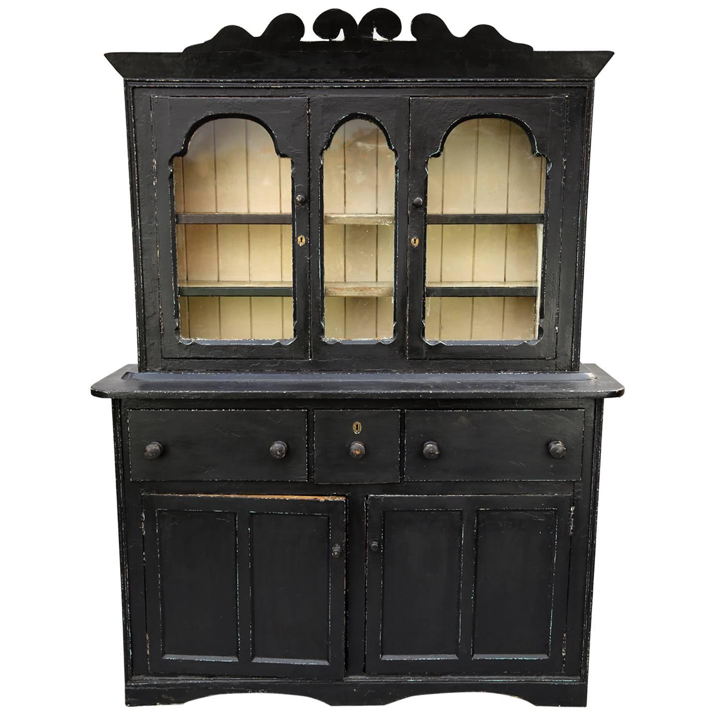 19th Century Georgian Irish Black Glazed Dresser w/ Primitive Carved Pediment For Sale