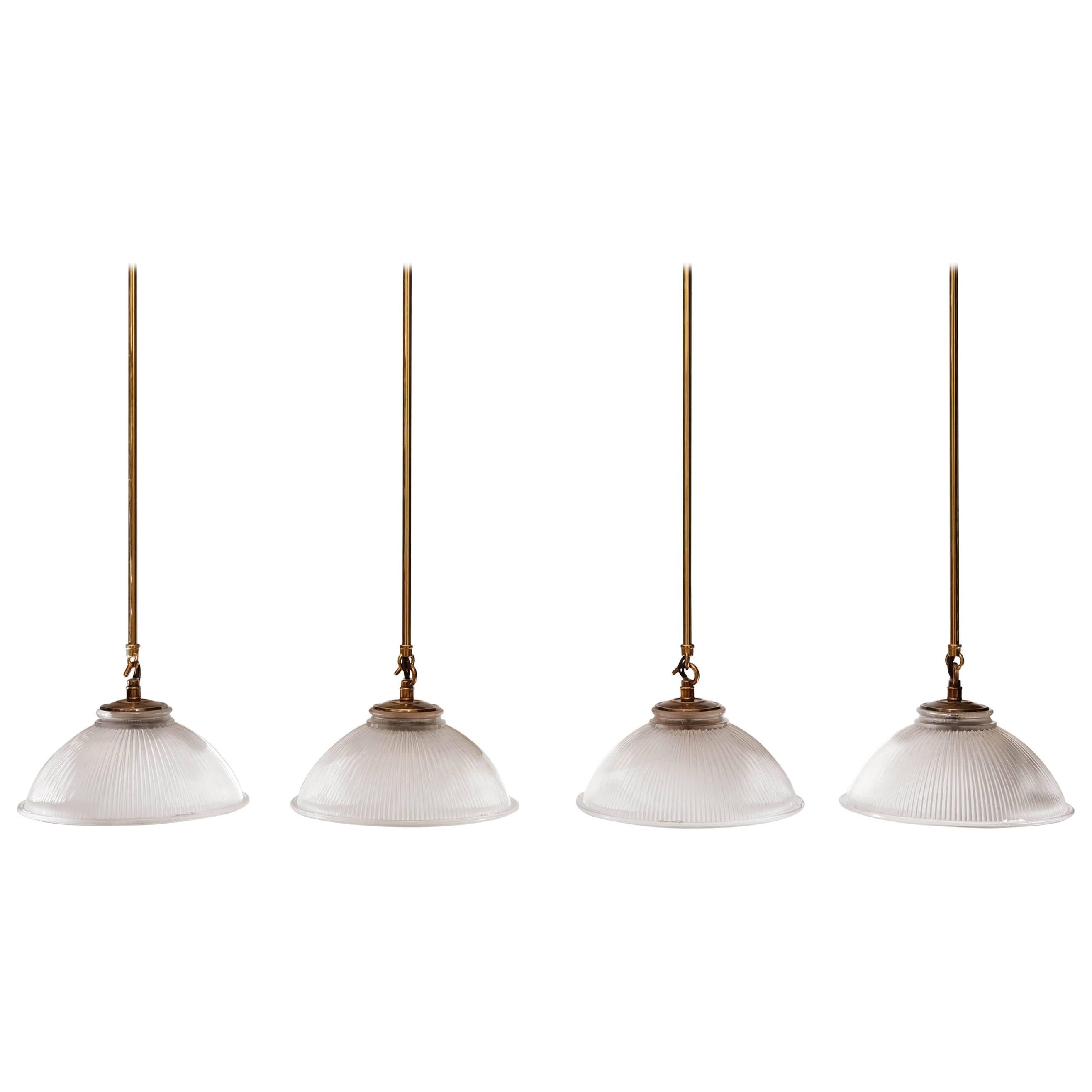Four Early 20th Century English Holophane Dish Lights with Antiqued Brass Mounts For Sale