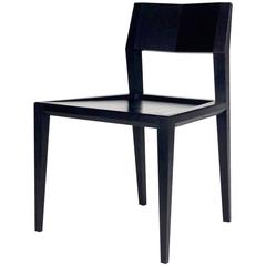 Armless Contemporary Ash Chair with Faceted Legs and Seat Back