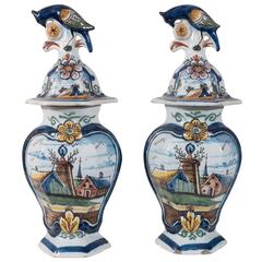 Pair of Delft Mantle Vases with Polychrome Country Scene