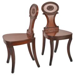 Pair of Regency Carved Mahogany Hall Chairs