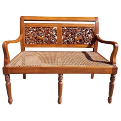 Caribbean Kings Wood Carved Foliage and Animal Cane Settee, Circa 1830