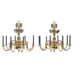 Pair of Mid-19th Century Eight-Branch Brass Chandeliers, possibly Austrian.