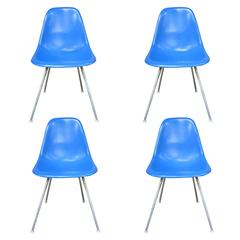 Four Herman Miller Eames DSX Dining Chairs