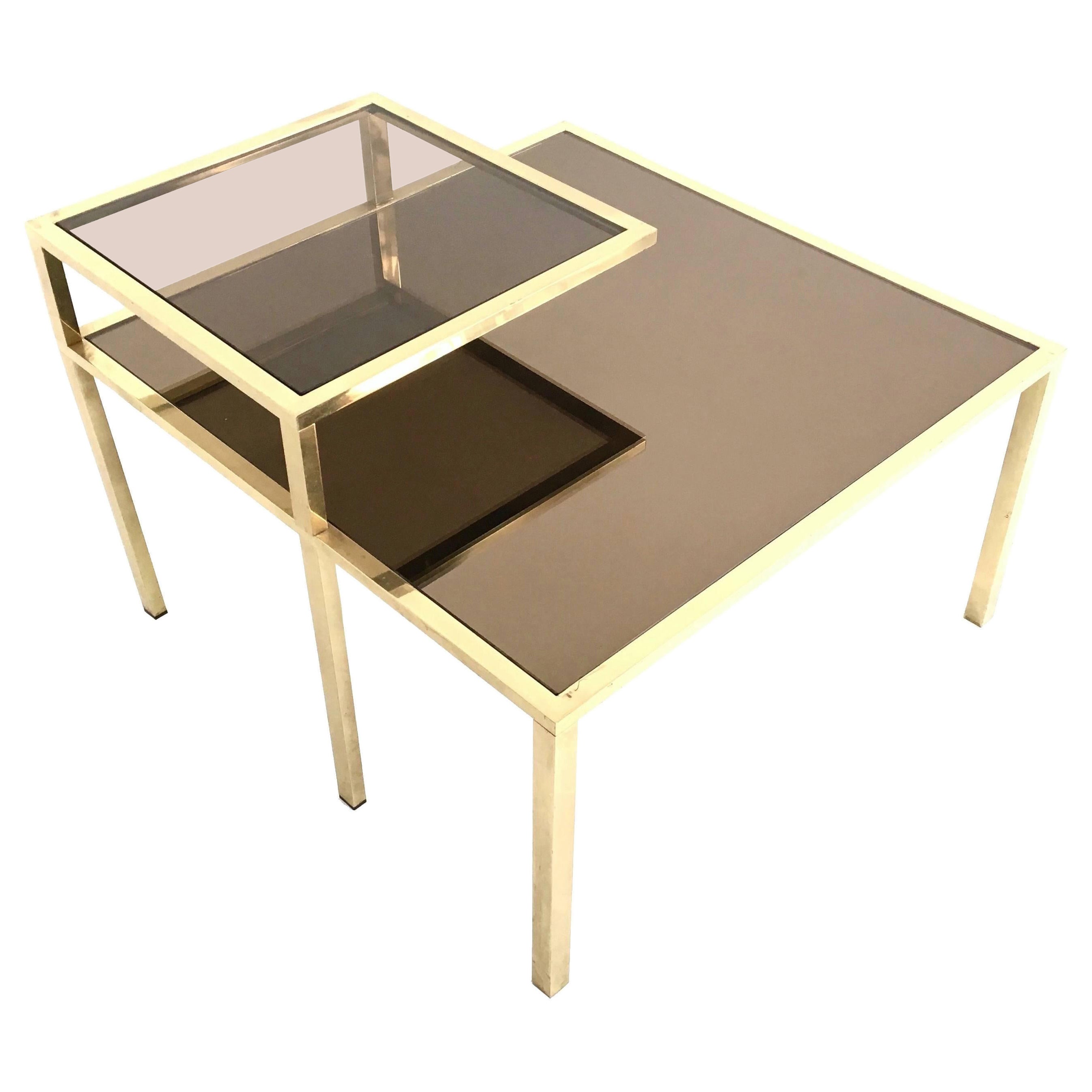 Made in Italy, 1980s.
Ascribable to Romeo Rega.
This coffee table features a brass frame, a glass shelf and a mirrored top.
It may show slight traces of use since it's vintage, but it can be considered as in very good original condition and ready to