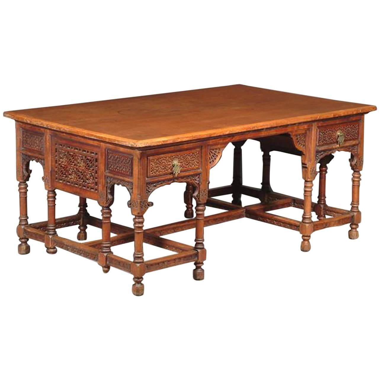An Anglo-Moorish Walnut Partners' Desk, Attributed to Liberty and Co.