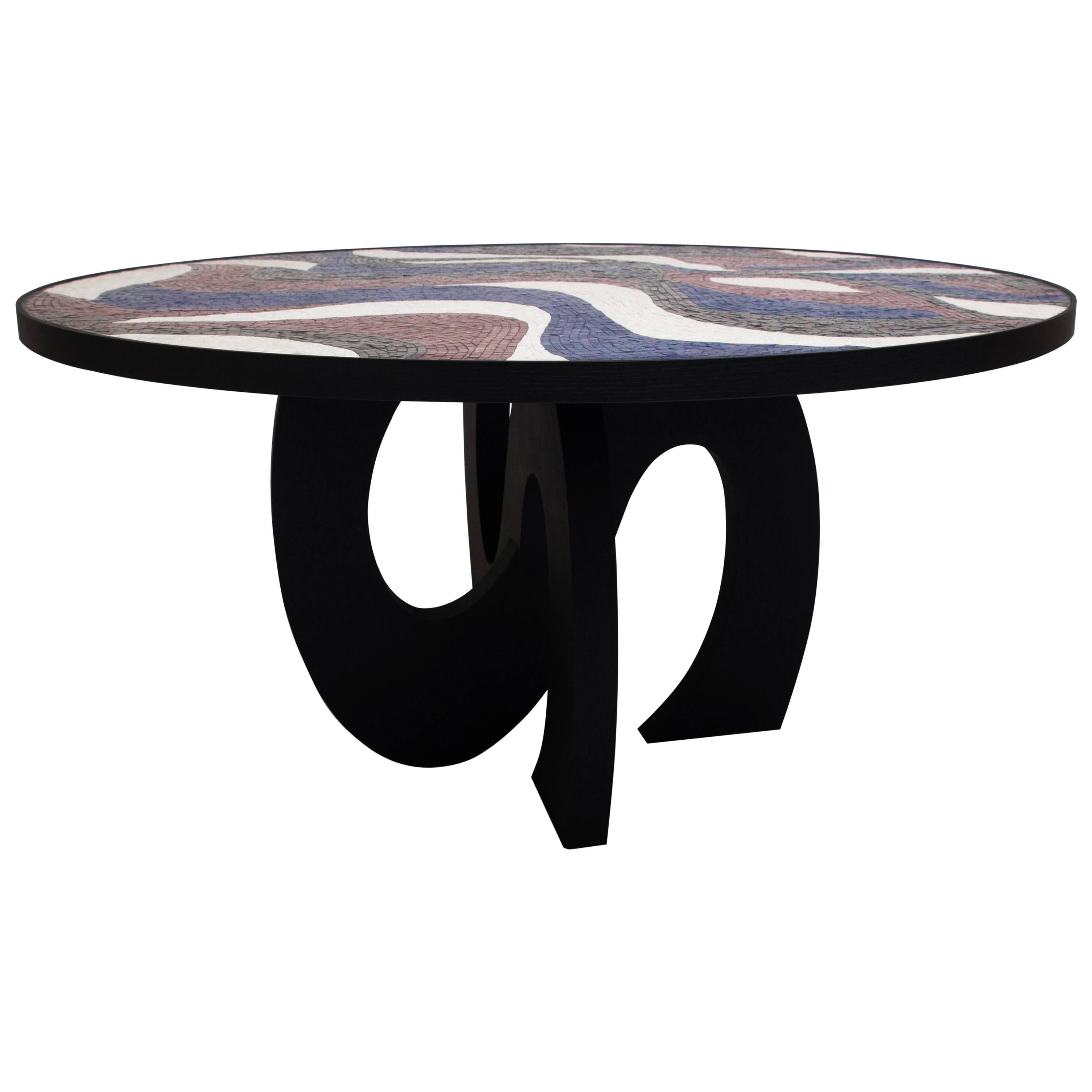 Center or dining table featuring custom hand-cut stone mosaic in Nero Marquina, Bottocino marble, Lebanese cherry and Blue Quartz with black stained wood base by Kelly Behun Studio. 
60